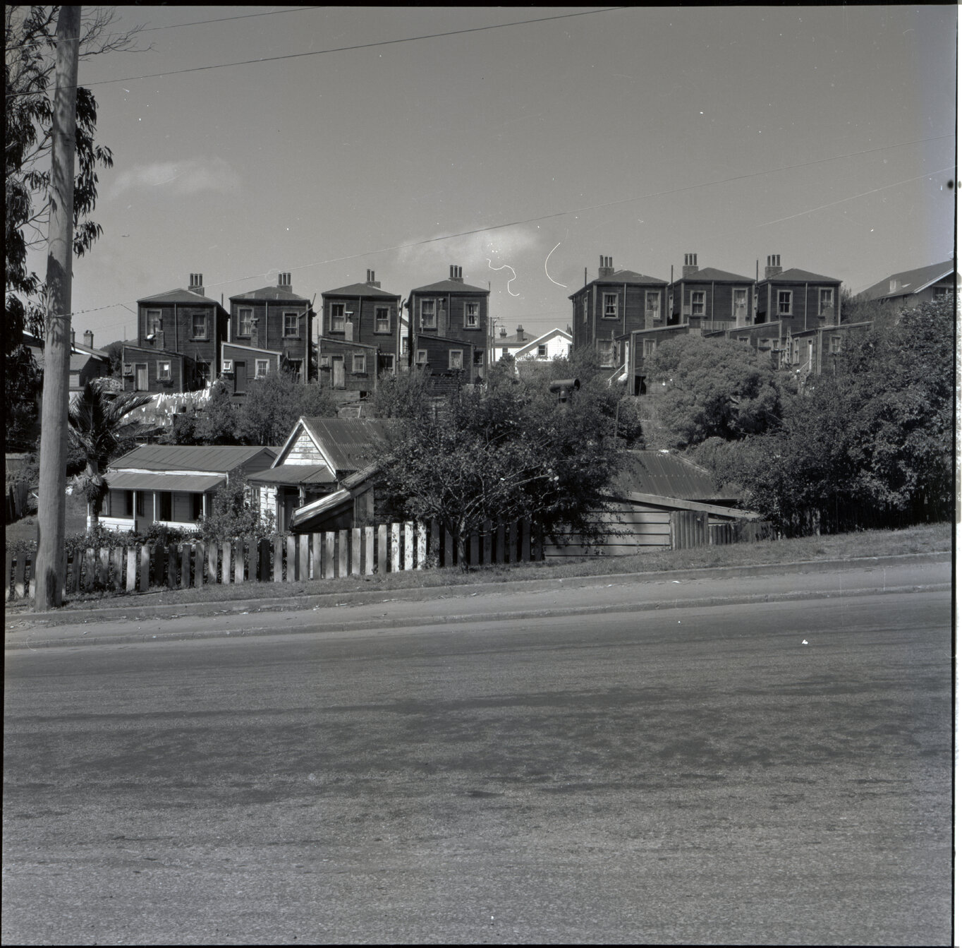 n. Two storey wooden dwellings on Nairn Street, from Brooklyn Road - the back of the 'seven sisters'