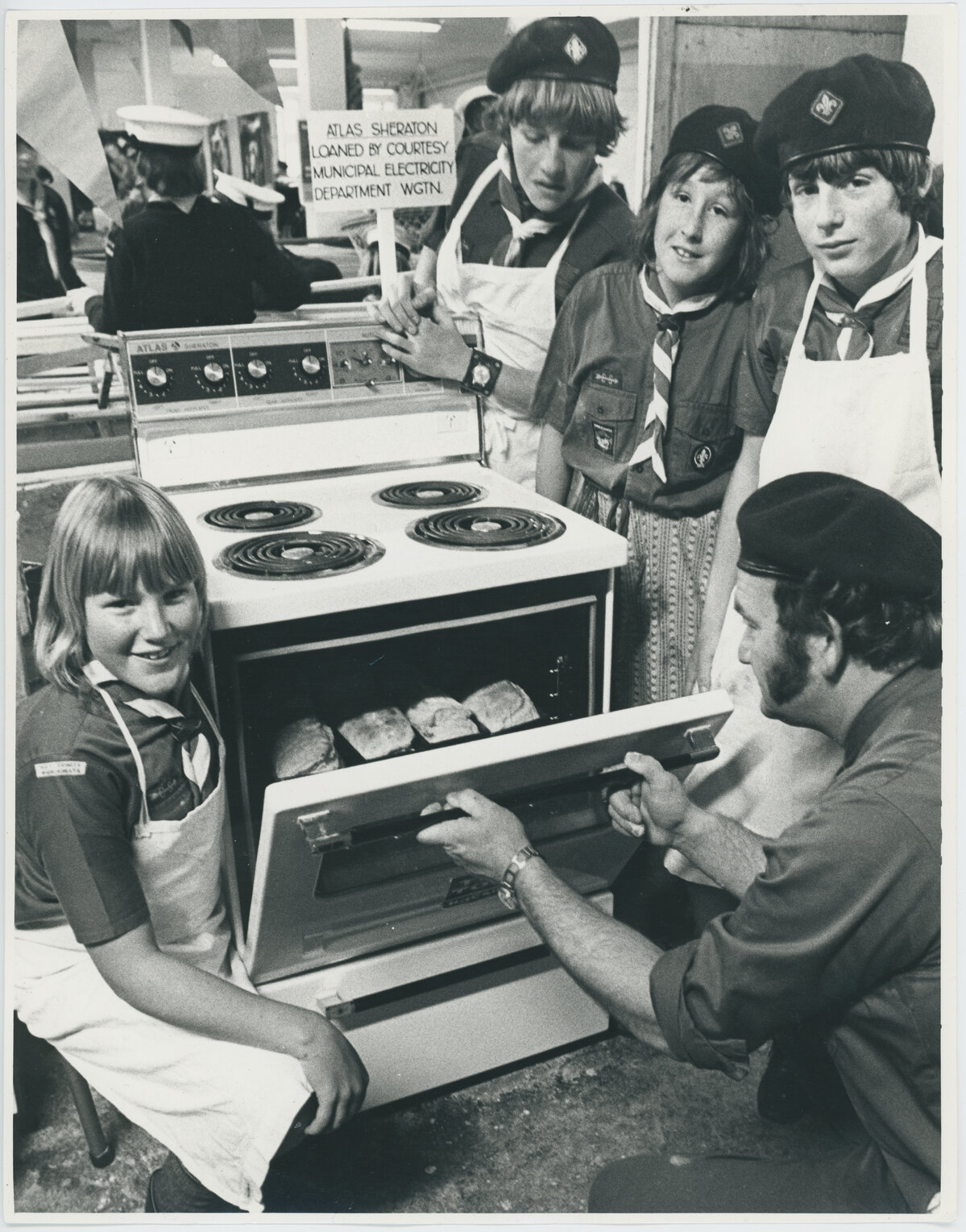 Scouts cooking on an electric oven