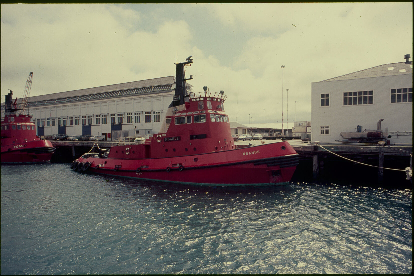 Harbour and wharf area, tugs