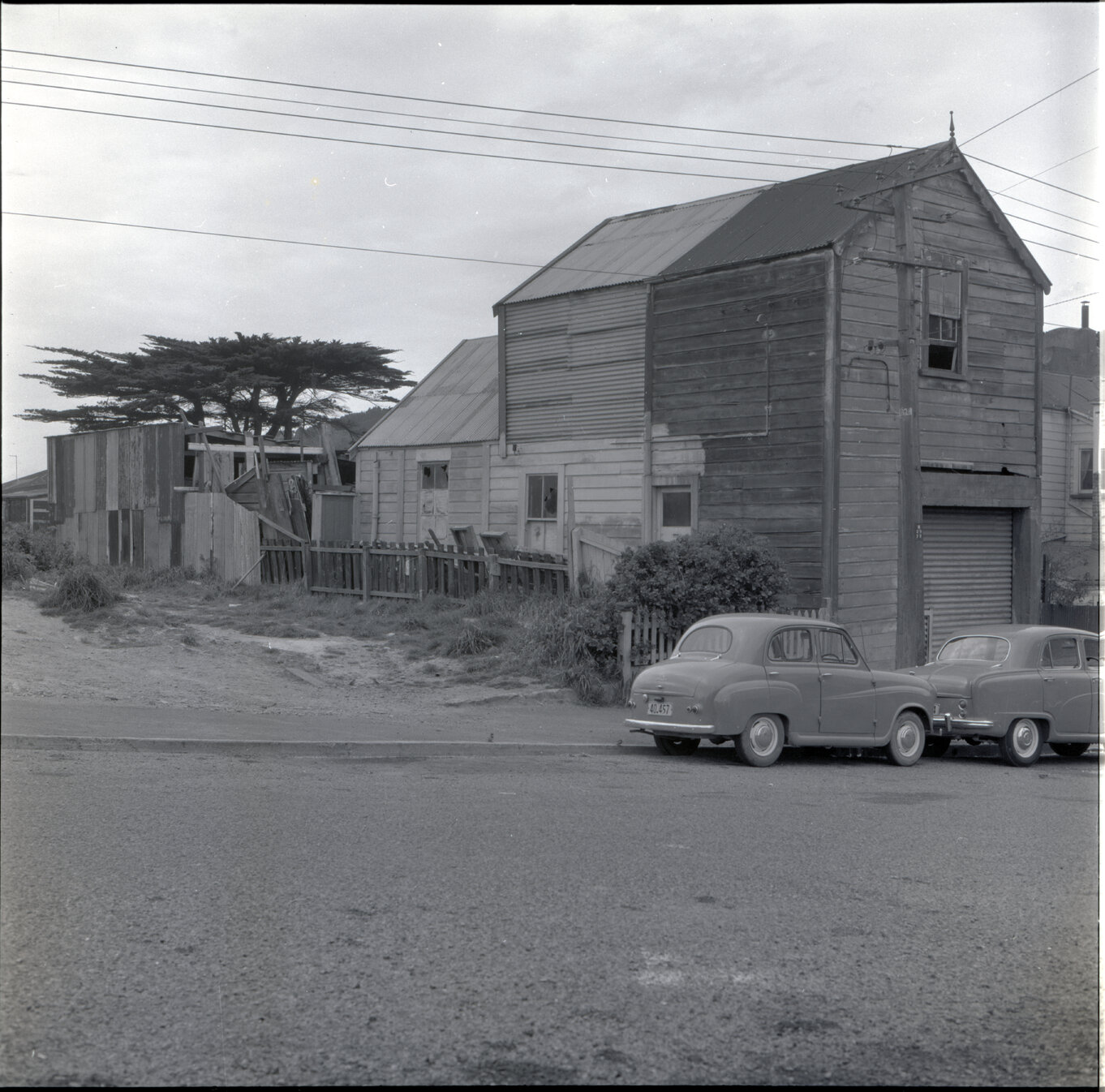 g. Sub-standard building, Drummond Street, a two story wooden building