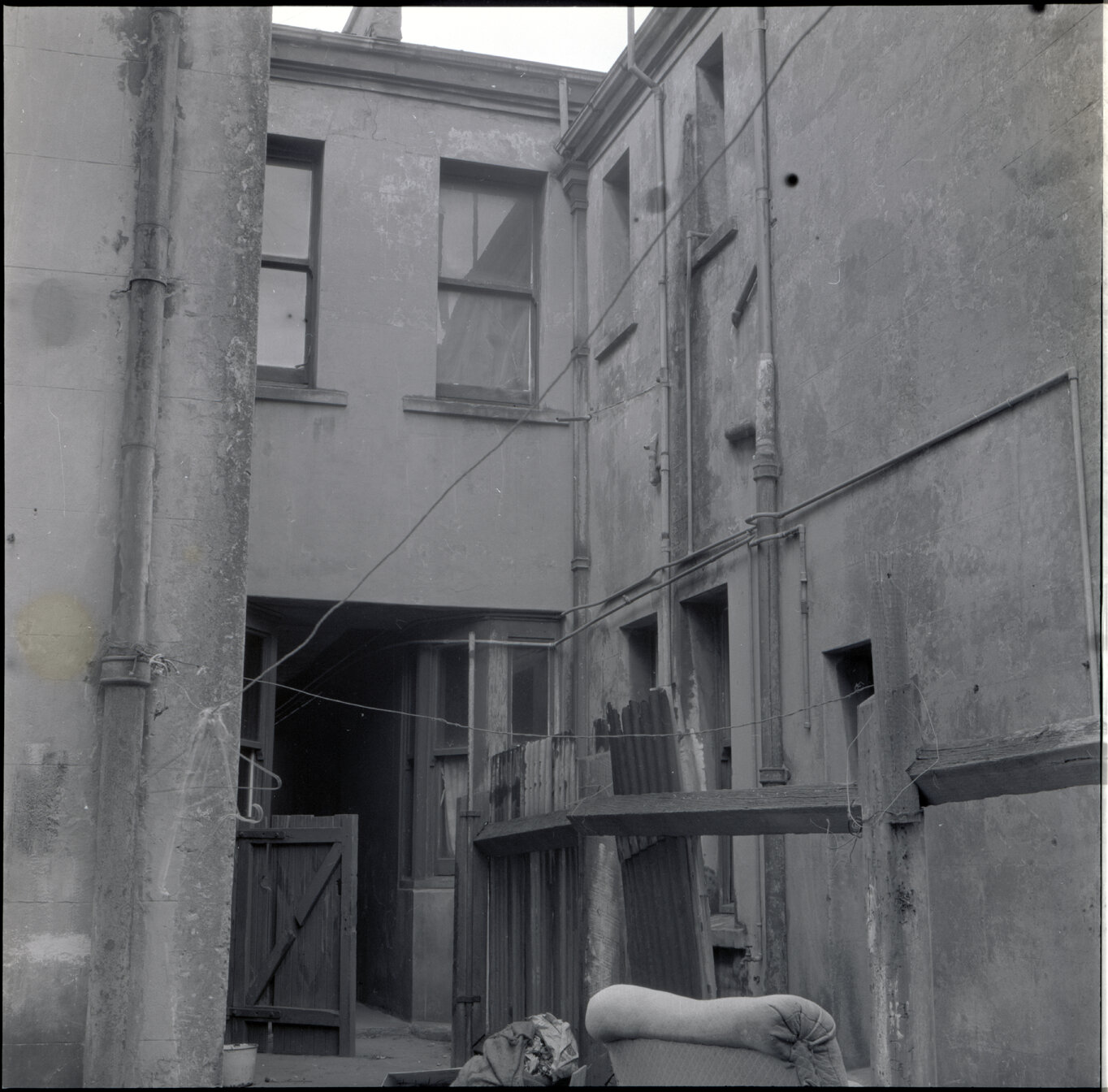 h. Sub-standard building, Drummond Street, a two story wooden building