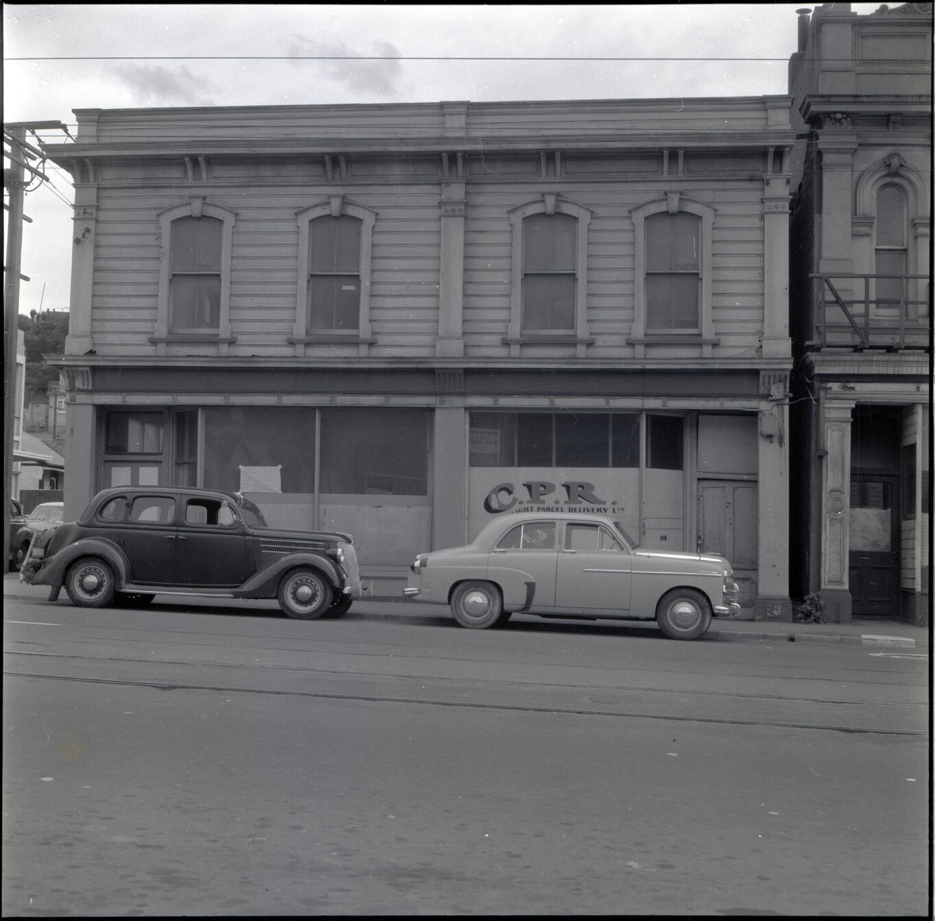 l. Sub-standard building, Drummond Street, a two story wooden building