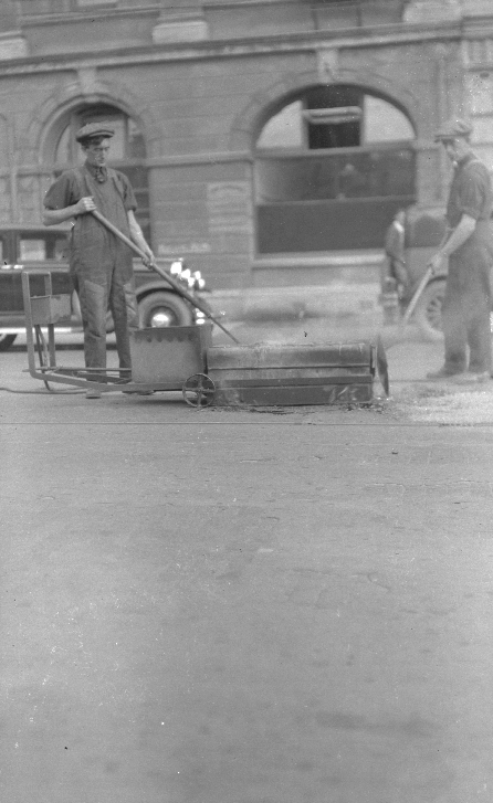 Workmen with Bitumen Oven