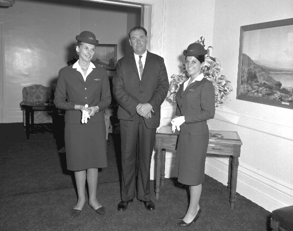 Air Hostesses of KLM, presentation of a book to Sir Frank Kitts, from Mayor of Amsterdam