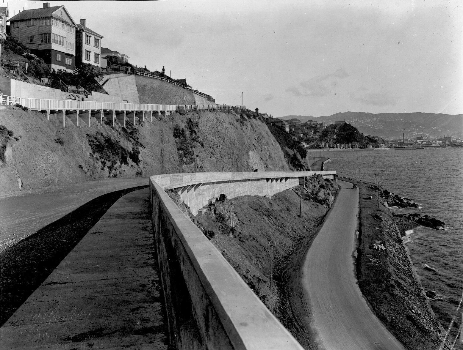 Photograph of the new alsphaltic concrete surface, surfacing completed on Carlton Gore Road, May 1926 and Evans Bay Road, October 1925, Carlton Gore Road and Evans Bay Road, October 1925-May 1926