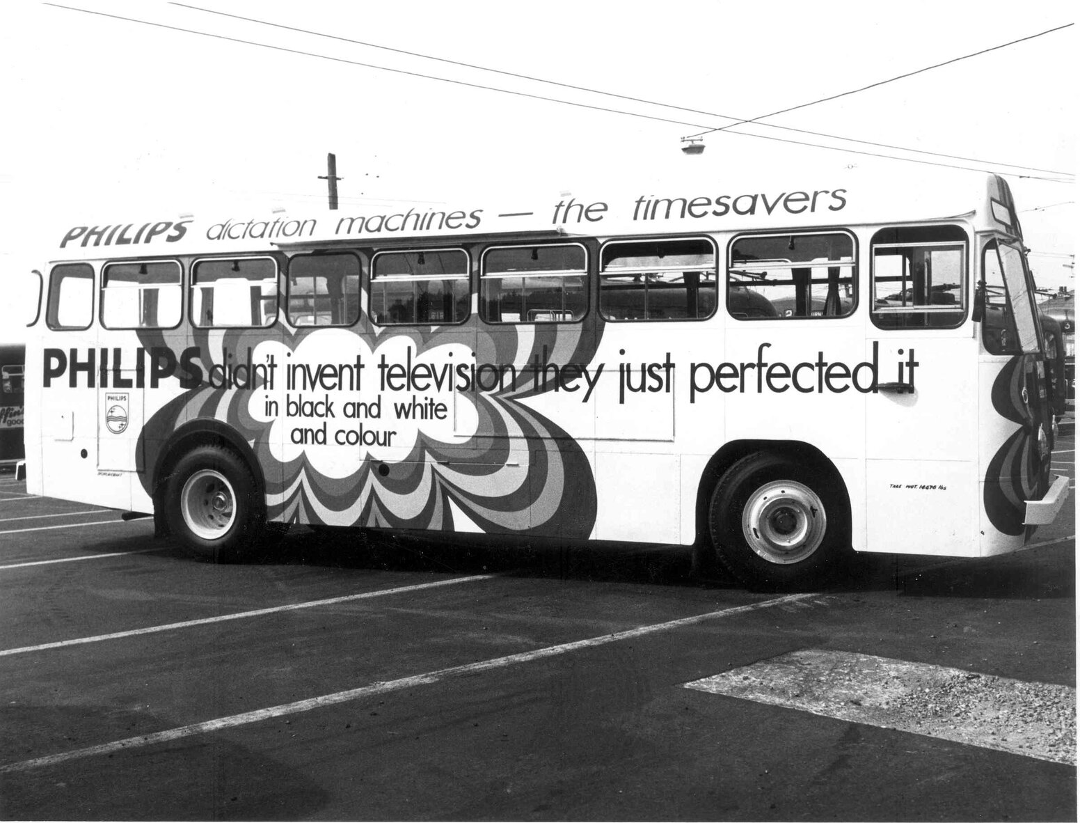 Bus with Philips TV advertisment painted on