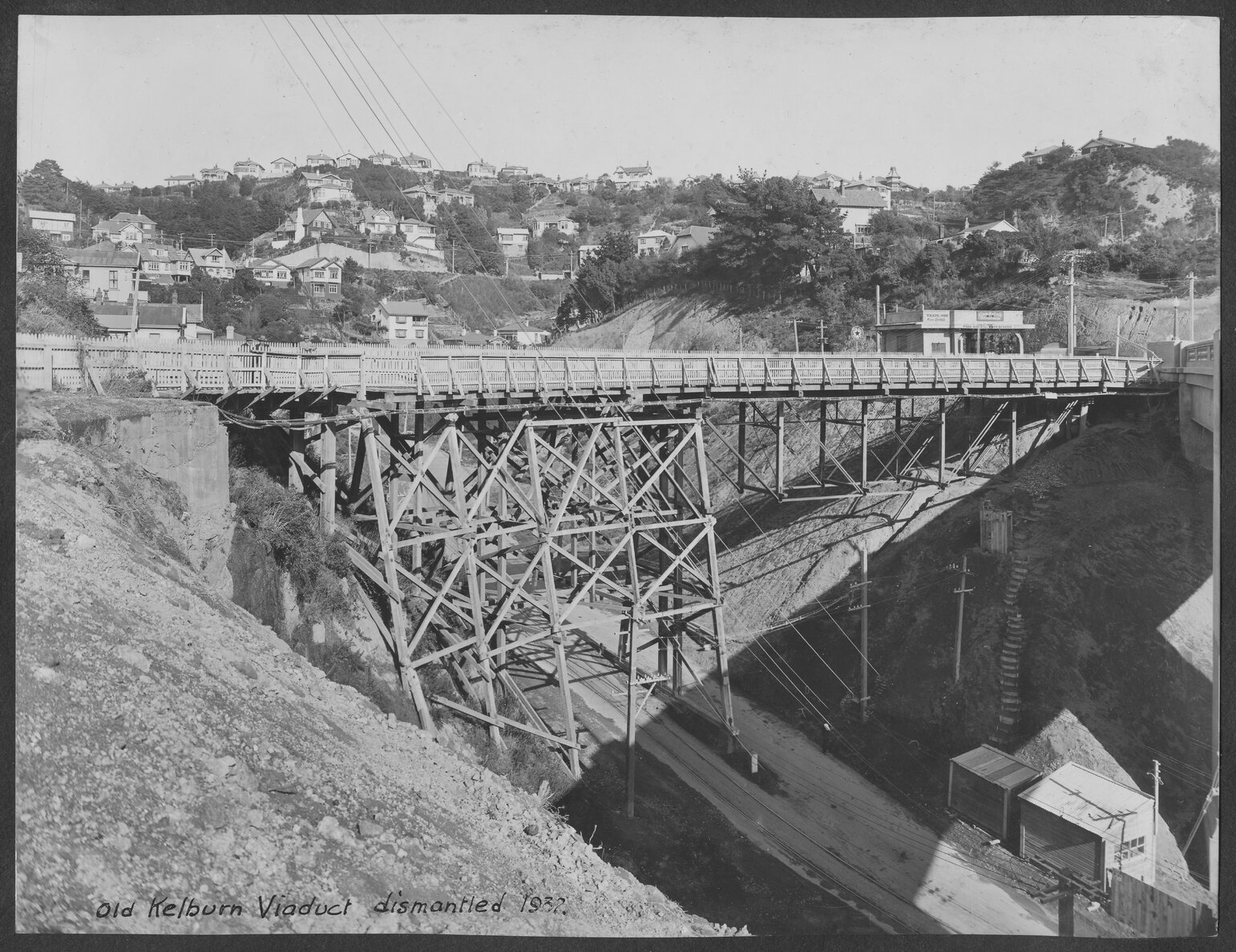 An elevated view of the old wooden Kelburn viaduct above Glenmore Street, previous to being dismantled in 1932. The new viaduct can be seen on the extreme right.