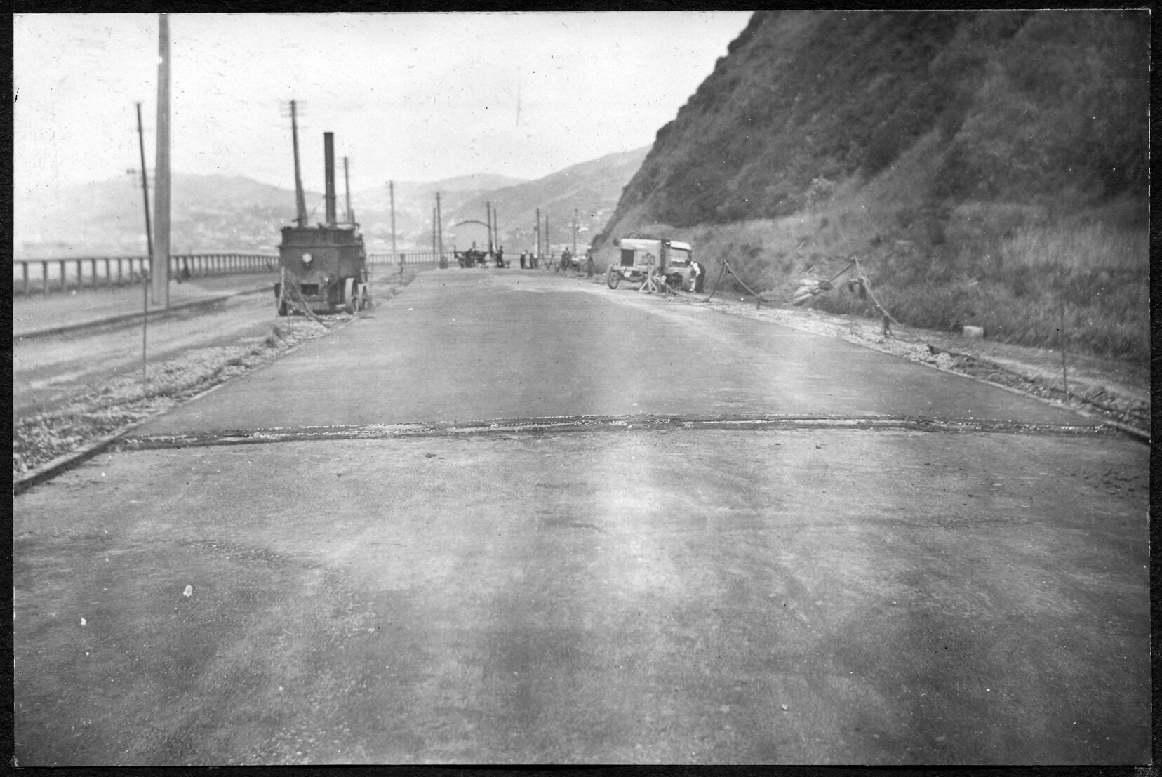 Portion of road with new seal.