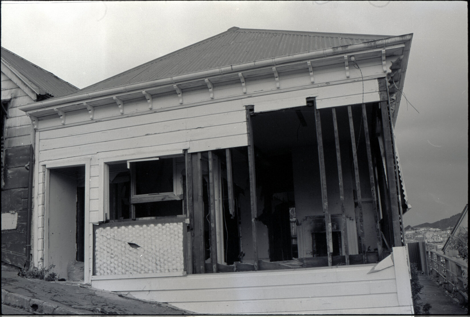 Brown Street: 6 and 8 occupied and destroyed by Mongrel Mob , exteriors and interior No 6, 1 and 3 buildings in poor condition, 41-43 Adelaide Road