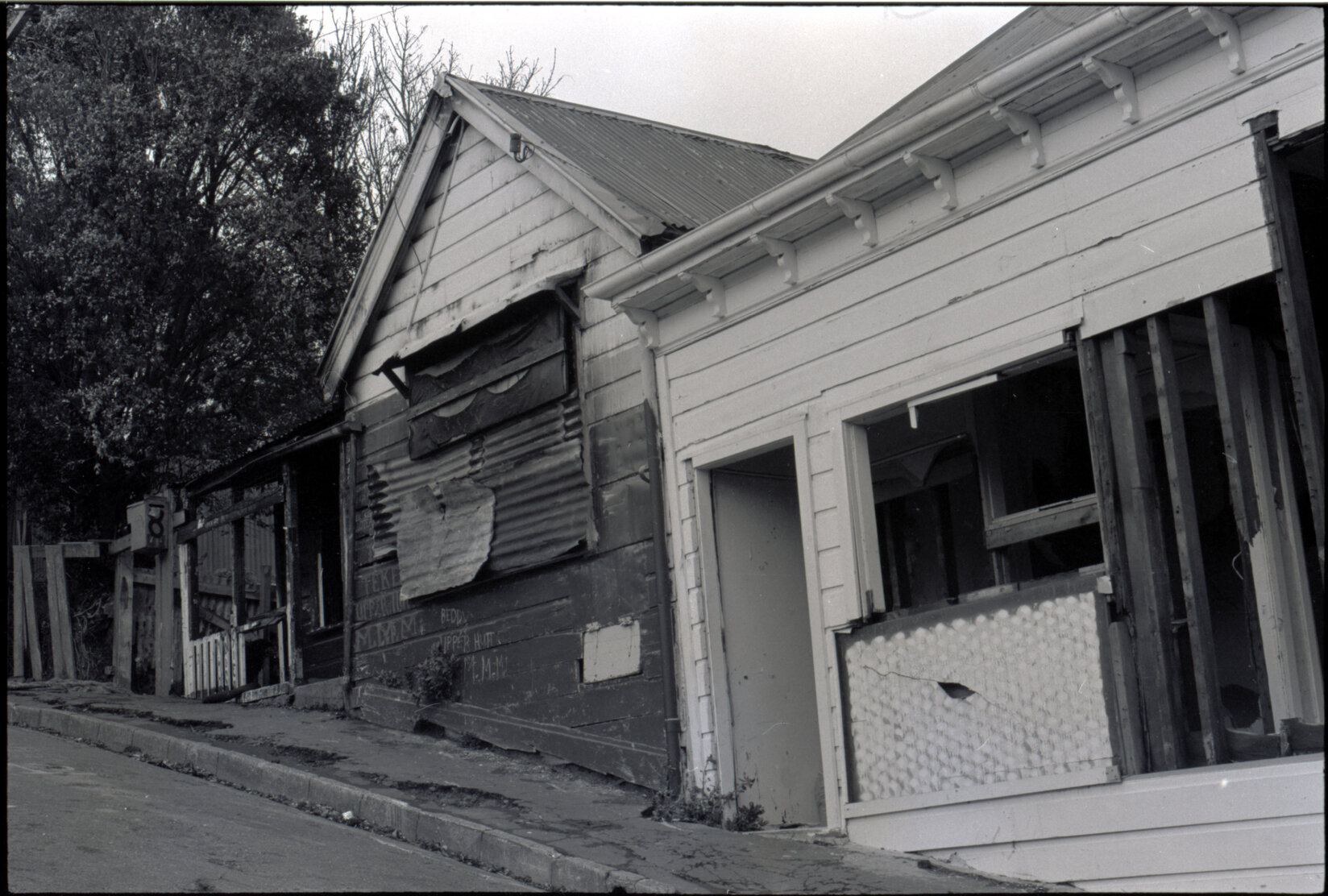 Brown Street: 6 and 8 occupied and destroyed by Mongrel Mob , exteriors and interior No 6, 1 and 3 buildings in poor condition, 41-43 Adelaide Road