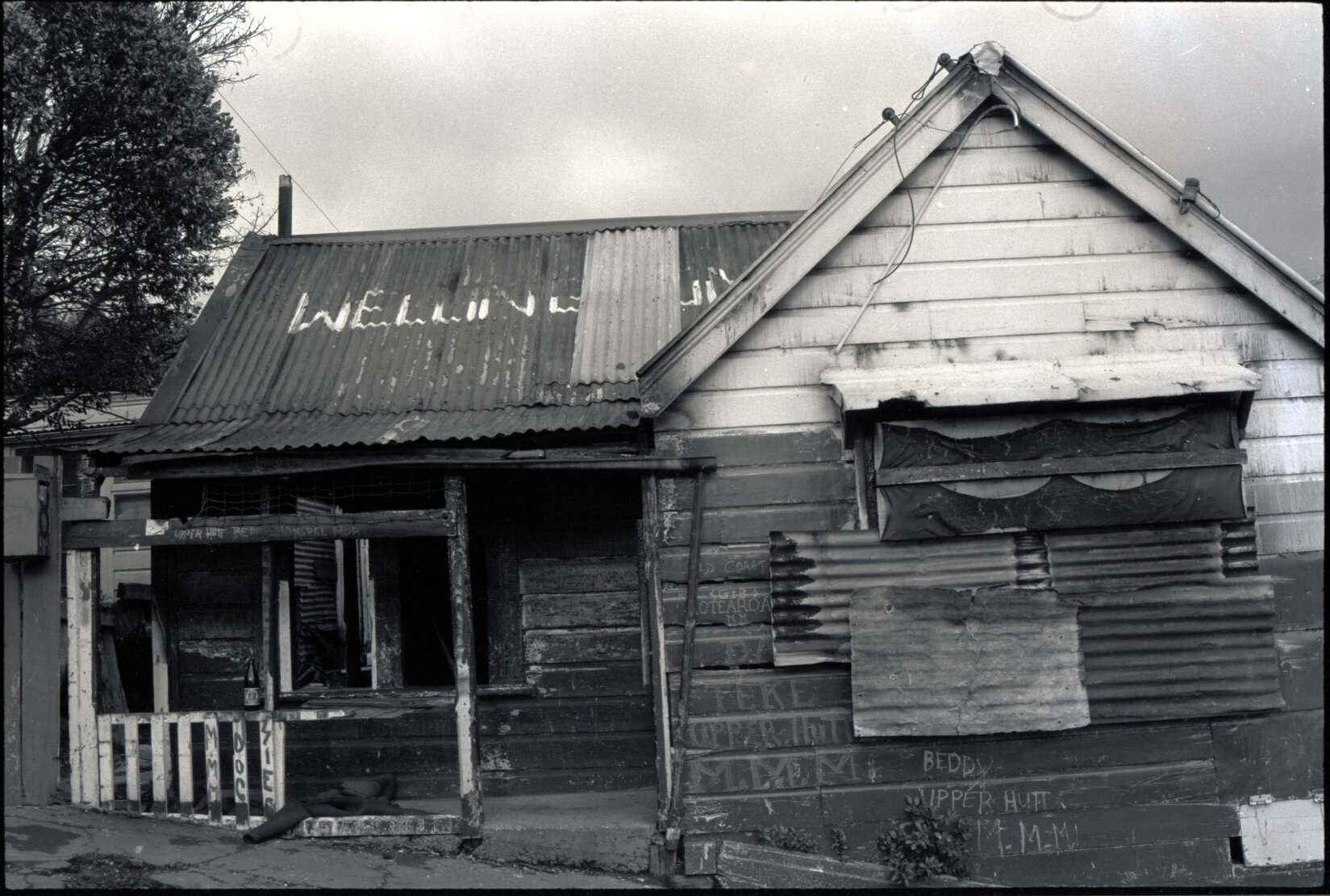 Brown Street: 6 and 8 occupied and destroyed by Mongrel Mob , exteriors and interior No 6, 1 and 3 buildings in poor condition, 41-43 Adelaide Road