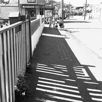 a. Group of children outside dairy / shop in background