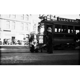 Courtenay Place, workmen using Celerity Grinder