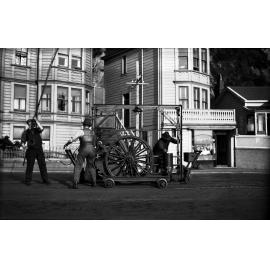 Oriental Parade, three workmen working with Reciprocating Grinder on newly laid tram rails