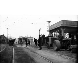 Glenmore Street, workmen operating the Cold Fix Spraying Outfit by newly laid tram rails