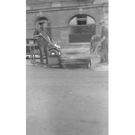 Workmen with Bitumen Oven