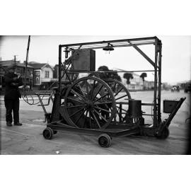 Cambridge Terrace and Vivian Street, workmen with a Reciprocating Grinder