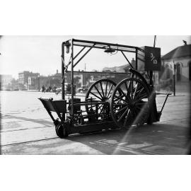 Cambridge Terrace and Vivian Street, workmen with a Reciprocating Grinder