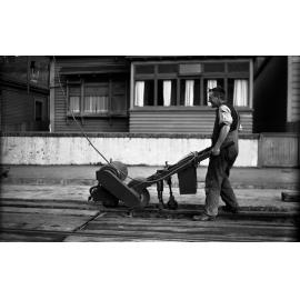 Aro Street, workman with Celerity Grinder