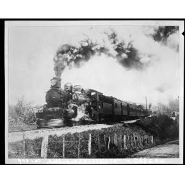 An 'A' Class steam locomotive hauls the Auckland Express through Khandallah