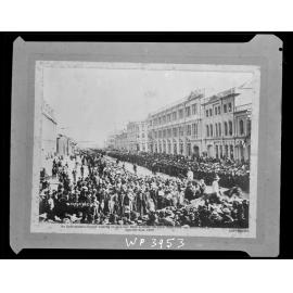 'An enthusiastic crowd waiting to give our Boys a cheer on their departure for South Africa'.