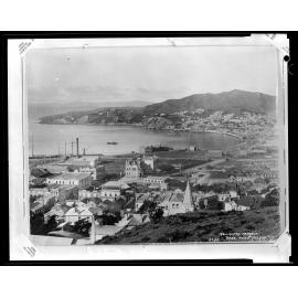 Elevated view of Wellington harbour and first Wellington Public Library