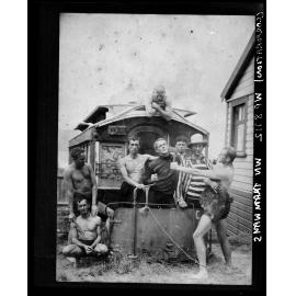 Clowning around in front of old horse tram