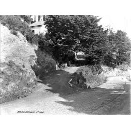 Unsealed road and drive access to property