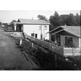 Khandallah Road and Awarua Street, Looking down the bank to a wooden dwelling
