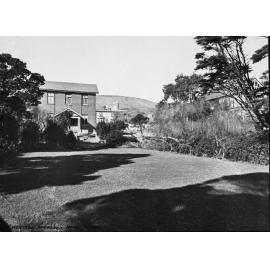 Land for the western approach to the new Mount Victoria Tunnel. School buildings for Wellington East Girl's College can be seen in the background