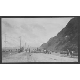 Workmen are laying new road seal on Hutt Road.