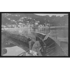 Oriental Bay from the east end, looking towards Te Aro. In the background workmen are in the process of building the seawall.