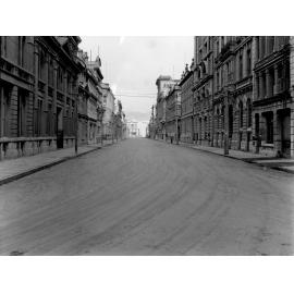 Photograph of the new alsphaltic concrete surface. Concrete commercial building facades, Victoria Street, March 1926
