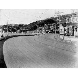 Photograph of the new alsphaltic concrete surface. Tram tracks in the road and the Band Rotunda is centre left, Oriental Parade, December 1926