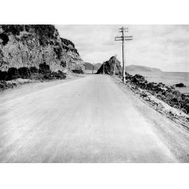 Photograph of the new alsphaltic concrete surface. View along the coast towards Pencarrow Head, Days Bay [Muratai] Road, May 1926