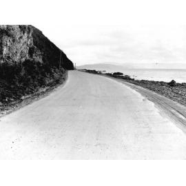 Photograph of the new alsphaltic concrete surface. Shows coastline, Days Bay [Muratai] Road, May 1926
