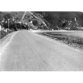Photograph of the new alsphaltic concrete surface on Muratai Road, previously identified as Days Bay Road, Rona Bay, May 1926