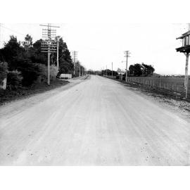 Photograph of the new alsphaltic concrete surface on Hutt Road, previously identified as Main Hutt Road . A rural area, Hutt Road, October 1925