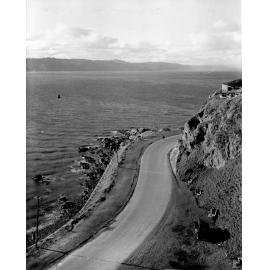 Photograph of the new alsphaltic concrete surface. At Point Jerningham, view across harbour to Hutt Valley, Point Jerningham & Evans Bay Road, March 1926