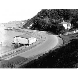 At Hataitai Swimming Club, photograph of the new alsphaltic concrete surface, Evans Bay Road, October 1925