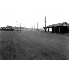 Lyall Bay Parade and Queens Drive intersection, bus shelter on right, Queens Drive, November 1925