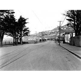 Kilbirnie Park on the left, looking up towards Crawford Road. Tram tracks in road, Kilbirnie Crescent, February 1926