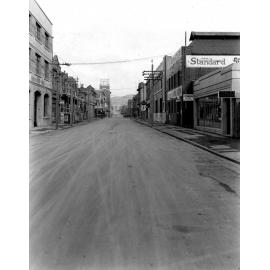 Photograph of new asphaltic concrete surface. North end of Tory Street looking south towards intersection with Courtenay Place, no. 11 is on the left, Tory Street, September 1925