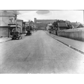 Looking towards Tasman Street intersection, with the Mount Cook Gaol on hill in background, 1926
