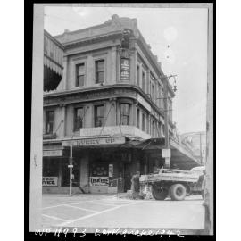 West corner of Allen Street and Courtenay Place [30-36 Courtenay Place], damage by earthquake being cleared away
