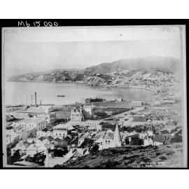 Elevated view of Wellington harbour and first Wellington Public Library