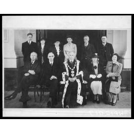 Mayor and committee members, Mayor T C Hislop wearing mayoral robes and chain
