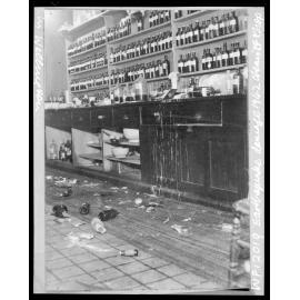 Interior of chemist's shop showing damage by 1942 earthquake