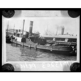 Ship, 'S T Pelican', moored at wharf