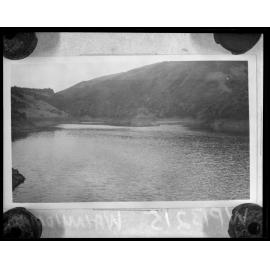 Wainuiomata, upper dam from dam wall showing water and surrounding hills